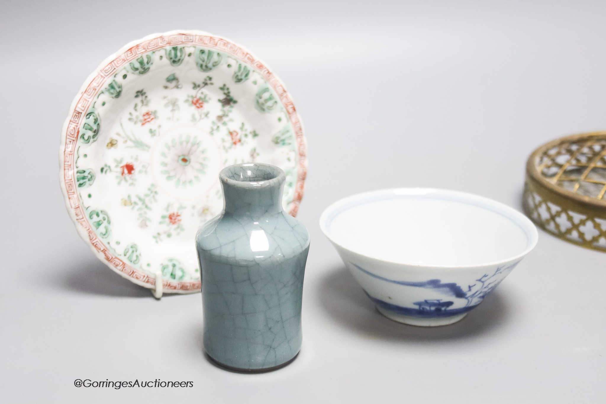 A miniature Chinese crackleglaze vase together with a blue and white bowl and a famille verte dish, diameter 13cm